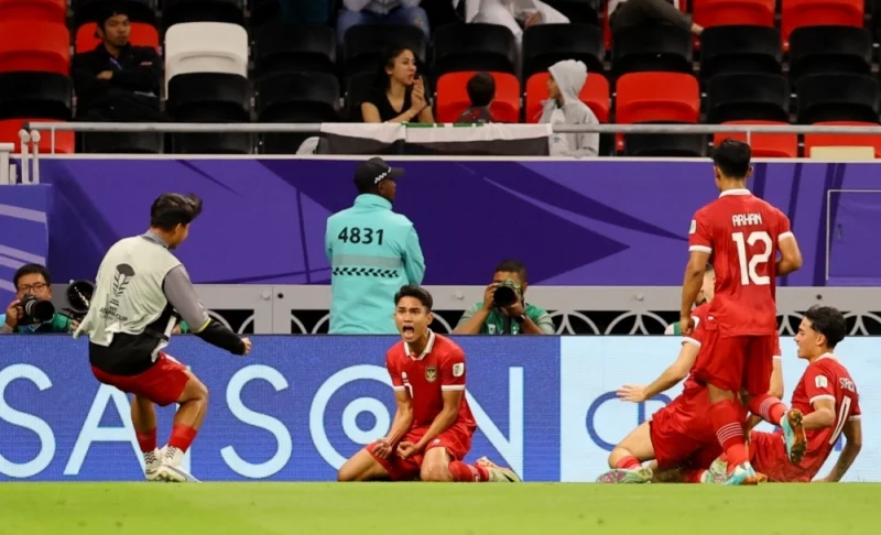 Niềm vui của các cầu thủ Indonesia khi ghi bàn gỡ hòa.