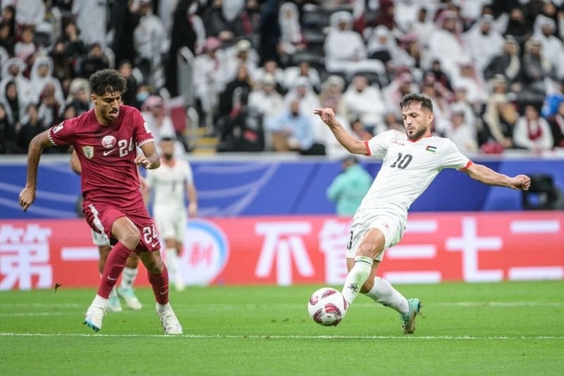 Trận đấu giữa Qatar và Palestine chứng kiến cột mốc mới. (Ảnh: AFC)